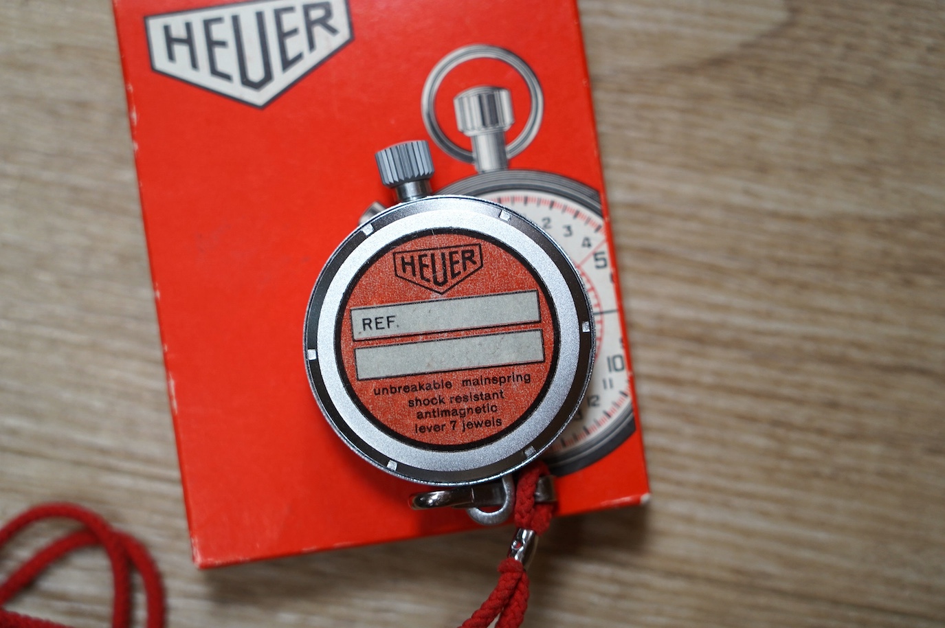 A 1960's chrome cased Heuer yacht timer, with polychrome dial, with associated box. Condition - good